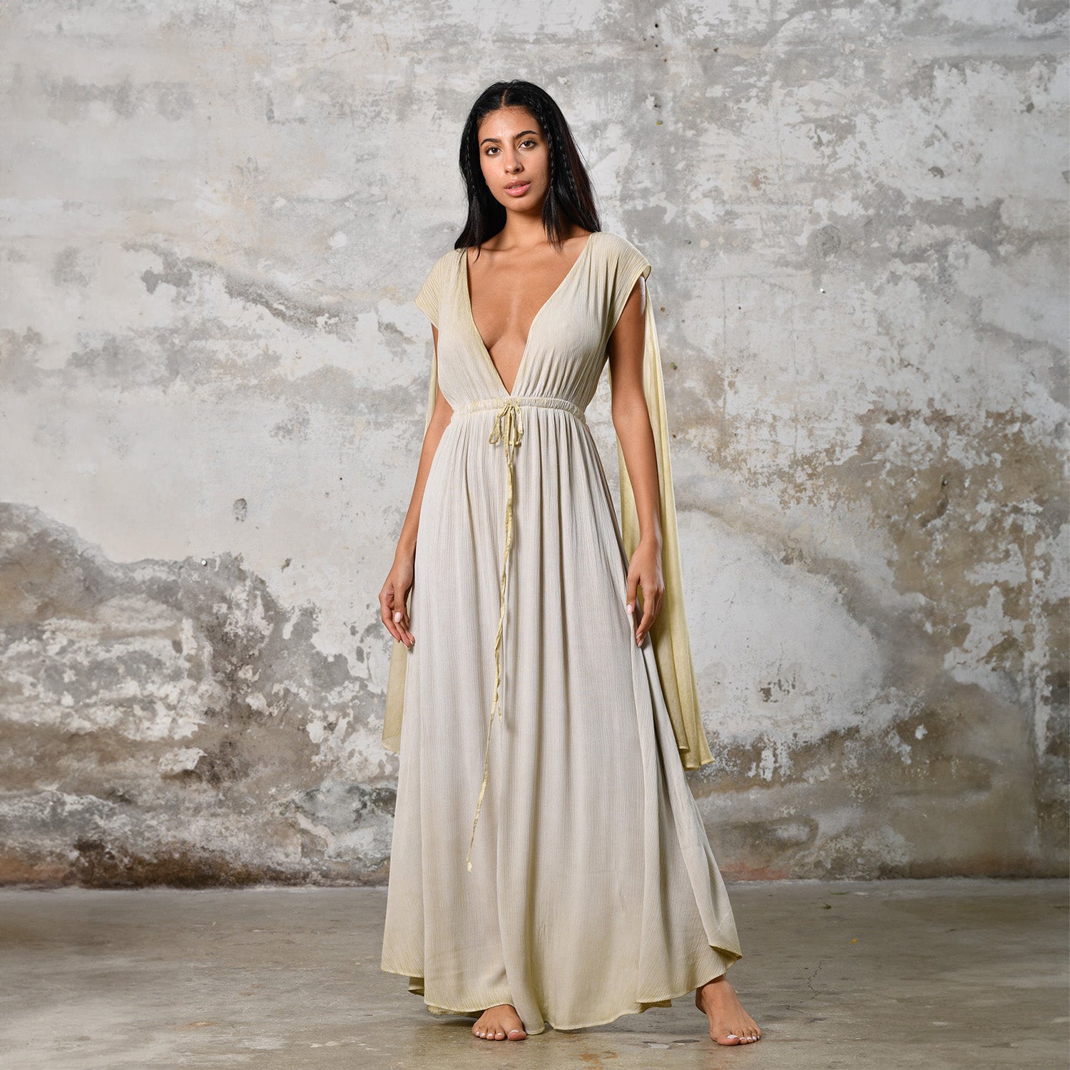 Celebrate divine femininity with our Greek Goddess Vibes Fairy Dress. Ethereal wings and perfect length make it a must-have addition to your wardrobe