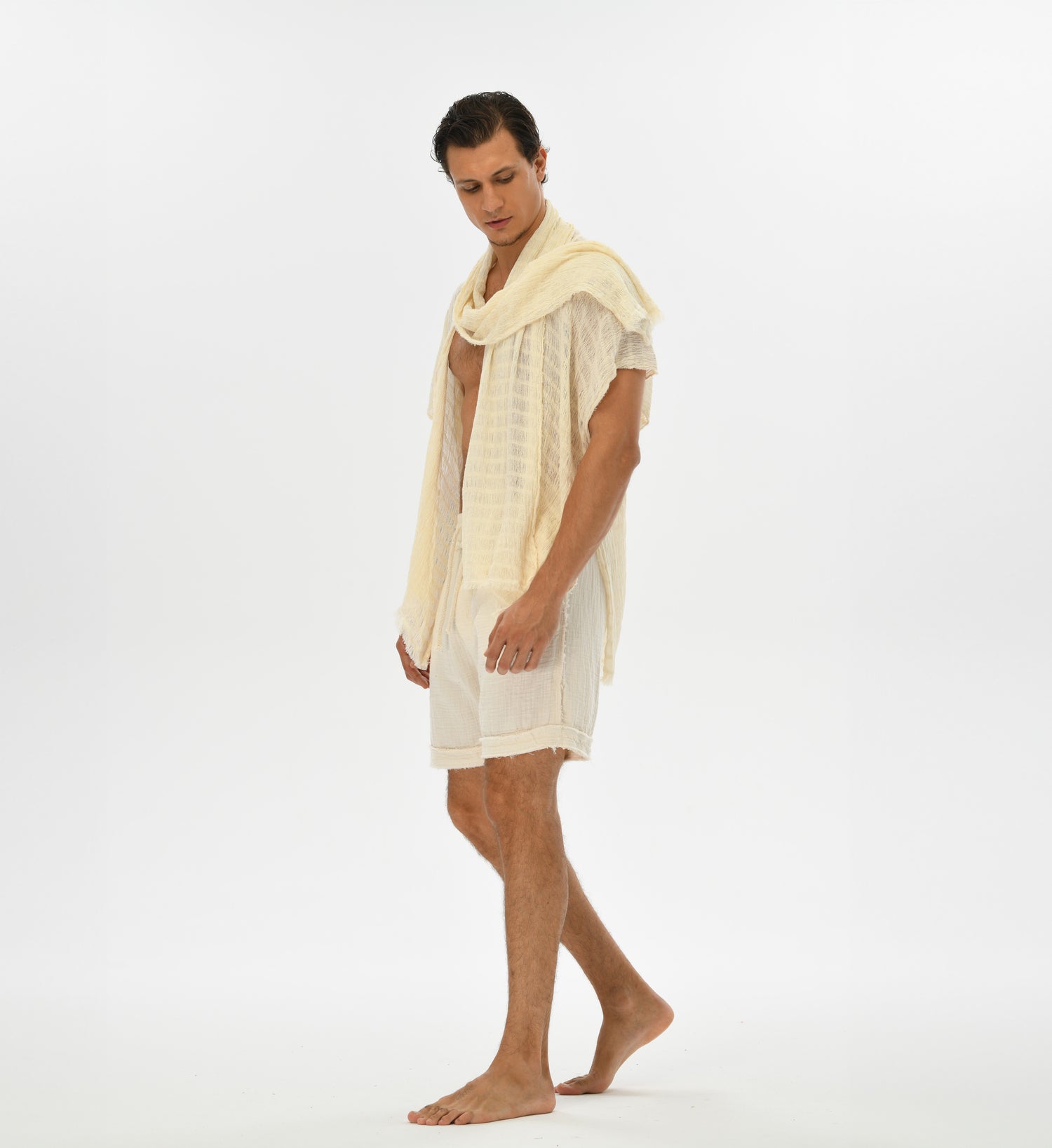 Unisex boho kimono made from breathable handwoven fabric with a unique shawl-hood, perfect for layering.