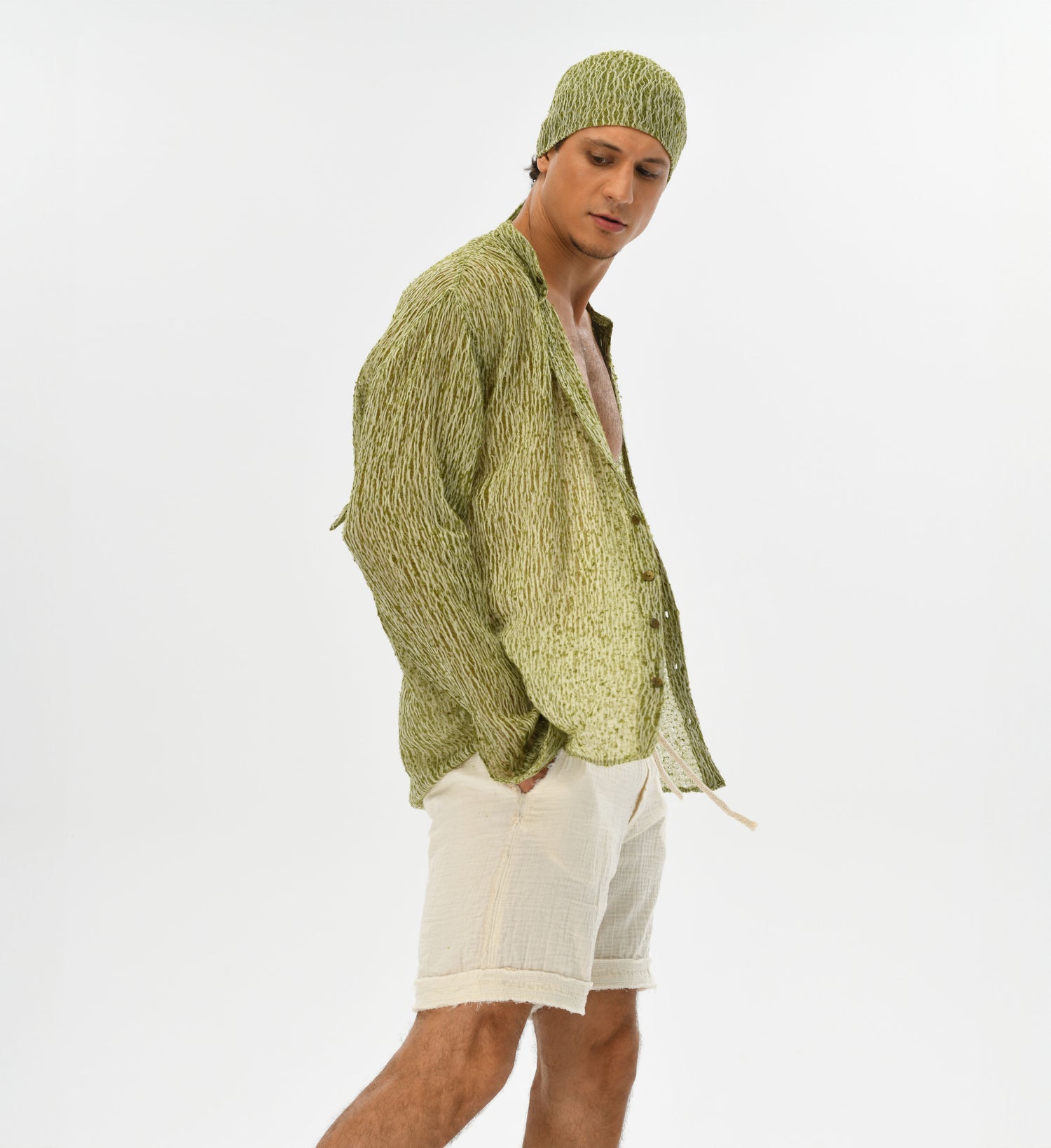 Handwoven eco-friendly men’s shirt in green and white, with raw texture for bohemian formal wear or festival outfits.