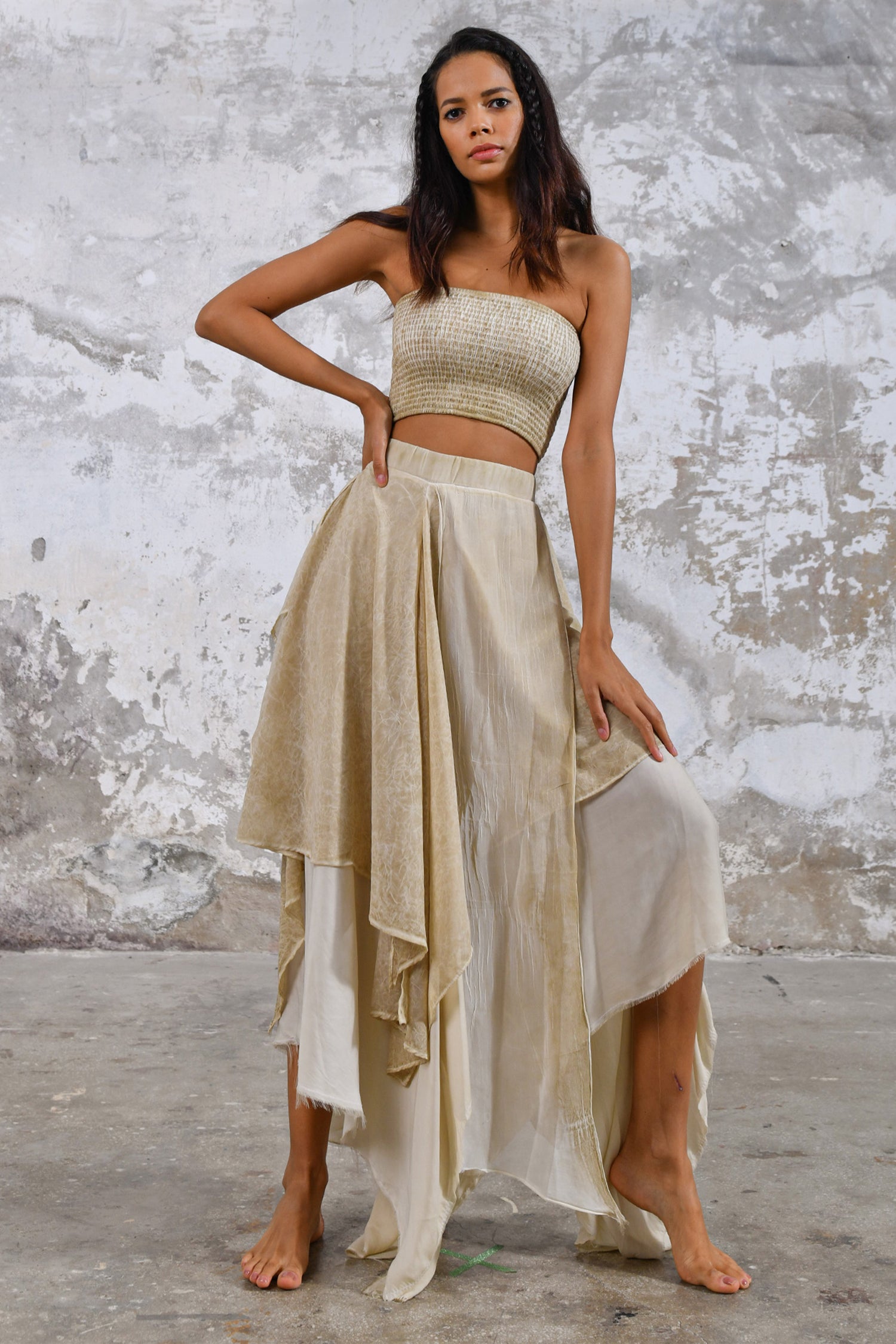 Bohemian maxi skirt made from organic cotton Flowy and asymmetric skirt for a free-spirited look Sustainable and eco-friendly clothing for conscious shoppers Rustic and earthy colors perfect for fall and winter Handmade embroidery and detailing for a unique touch Easy care organic cotton material for hassle-free washing and drying Size-inclusive boho clothing for all body types Casual or dressy maxi skirt for any occasion Perfect skirt for outdoor music festivals or beach weddings