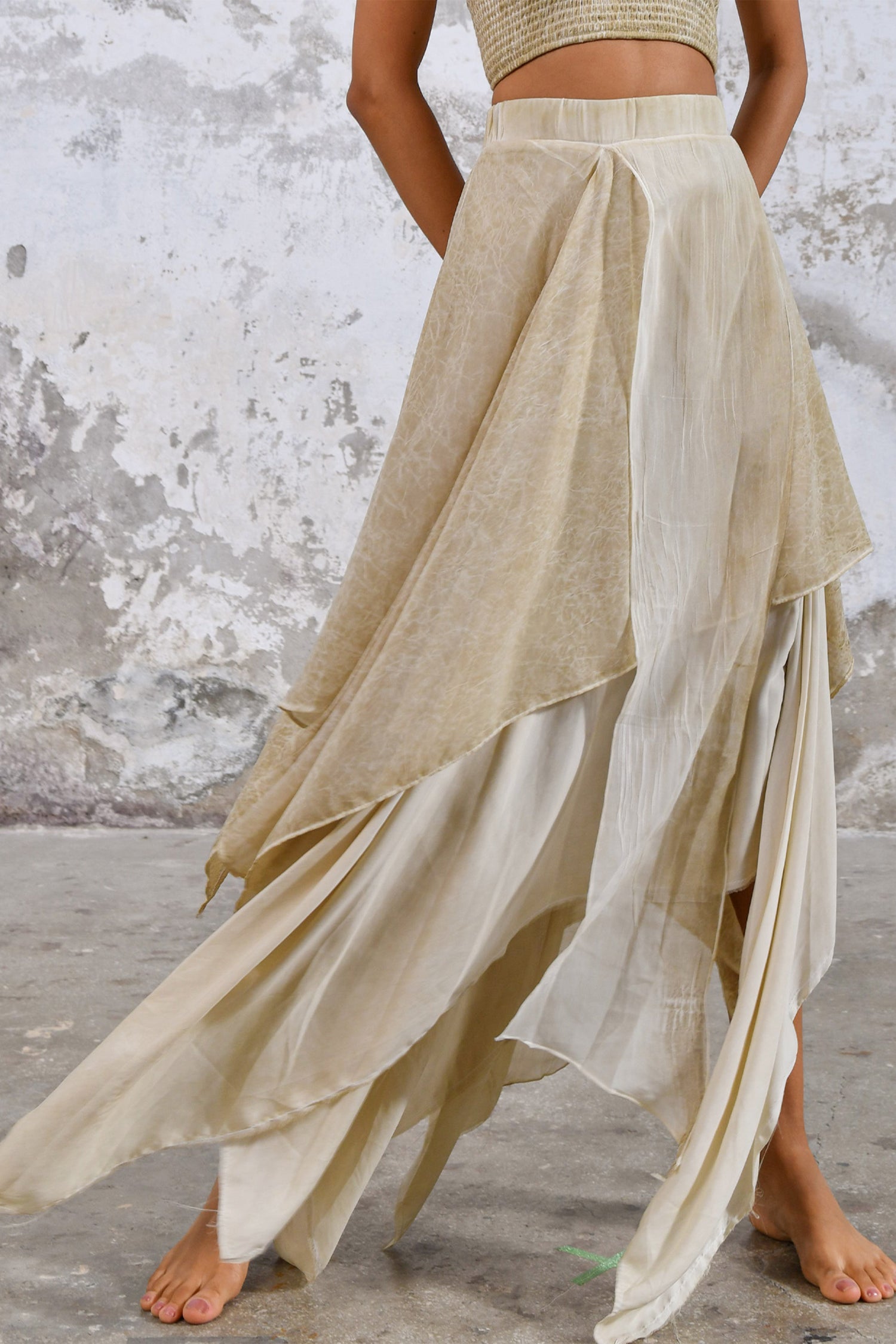 Bohemian maxi skirt made from organic cotton Flowy and asymmetric skirt for a free-spirited look Sustainable and eco-friendly clothing for conscious shoppers Rustic and earthy colors perfect for fall and winter Handmade embroidery and detailing for a unique touch Easy care organic cotton material for hassle-free washing and drying Size-inclusive boho clothing for all body types Casual or dressy maxi skirt for any occasion Perfect skirt for outdoor music festivals or beach weddings