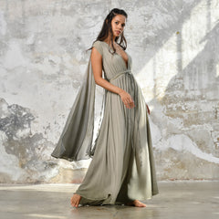 An enchanting Sage Green Greek Goddess Dress, perfect for any occasion. This elegant maxi dress features a flattering open back design, making it an ideal choice for a wedding guest or a bohemian-inspired event. The flowing, ethereal fabric and delicate details embody the essence of a Bohemian Gypsy Maxi Dress, exuding a Boho Sexy Elegant vibe.