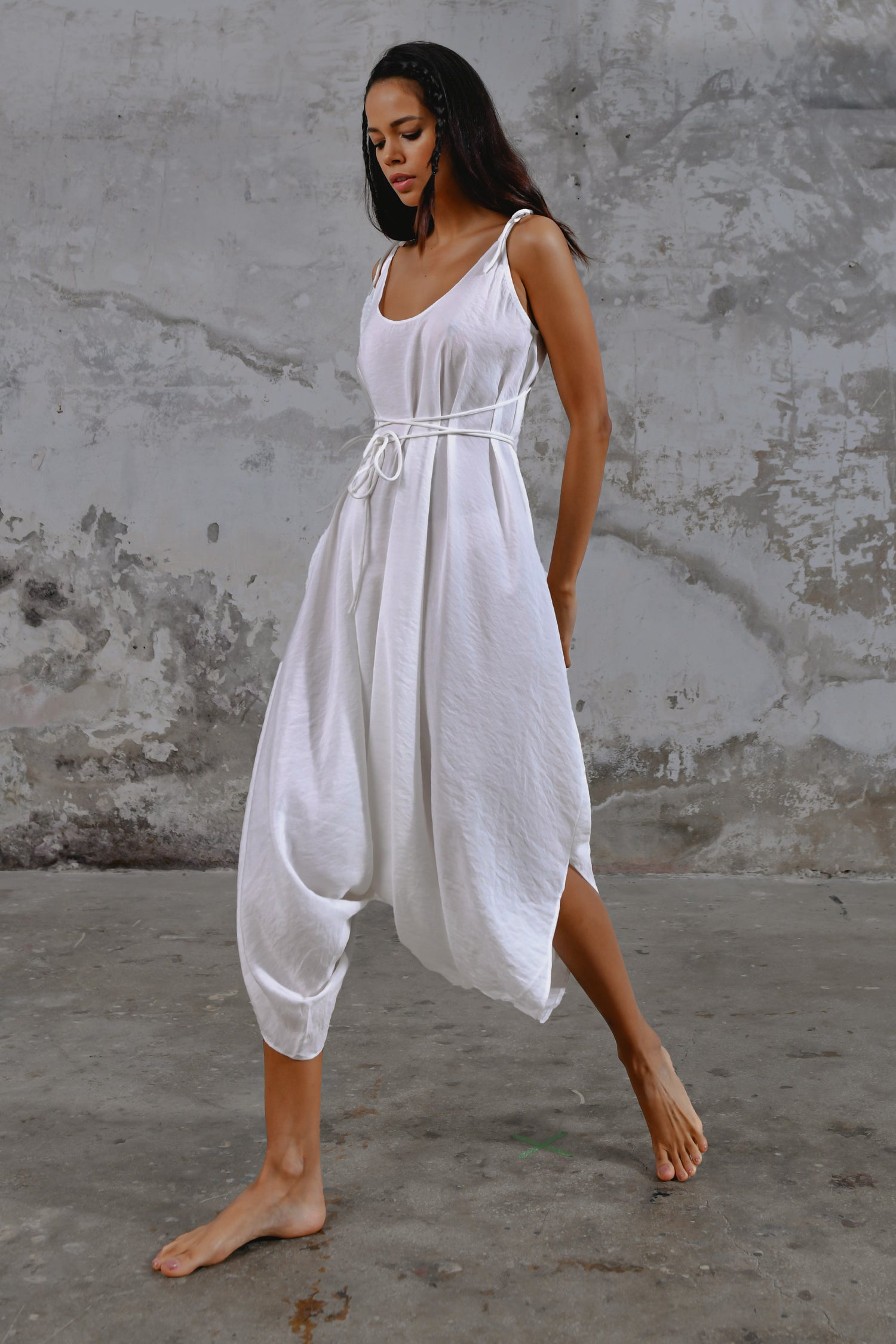 White boho goddess jumpsuit, loose fit jumpsuit, bohemian style jumpsuit, oversized jumpsuit, comfortable jumpsuit, casual jumpsuit, stylish jumpsuit, unique jumpsuit, handmade jumpsuit, sustainable fashion, eco-friendly jumpsuit, ethical clothing, versatile jumpsuit, one-piece outfit, summer jumpsuit, vacation outfit, travel-friendly jumpsuit, festival wear, statement piece, fashion-forward jumpsuit, timeless design.