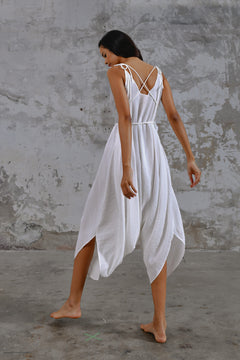 White boho goddess jumpsuit, loose fit jumpsuit, bohemian style jumpsuit, oversized jumpsuit, comfortable jumpsuit, casual jumpsuit, stylish jumpsuit, unique jumpsuit, handmade jumpsuit, sustainable fashion, eco-friendly jumpsuit, ethical clothing, versatile jumpsuit, one-piece outfit, summer jumpsuit, vacation outfit, travel-friendly jumpsuit, festival wear, statement piece, fashion-forward jumpsuit, timeless design.