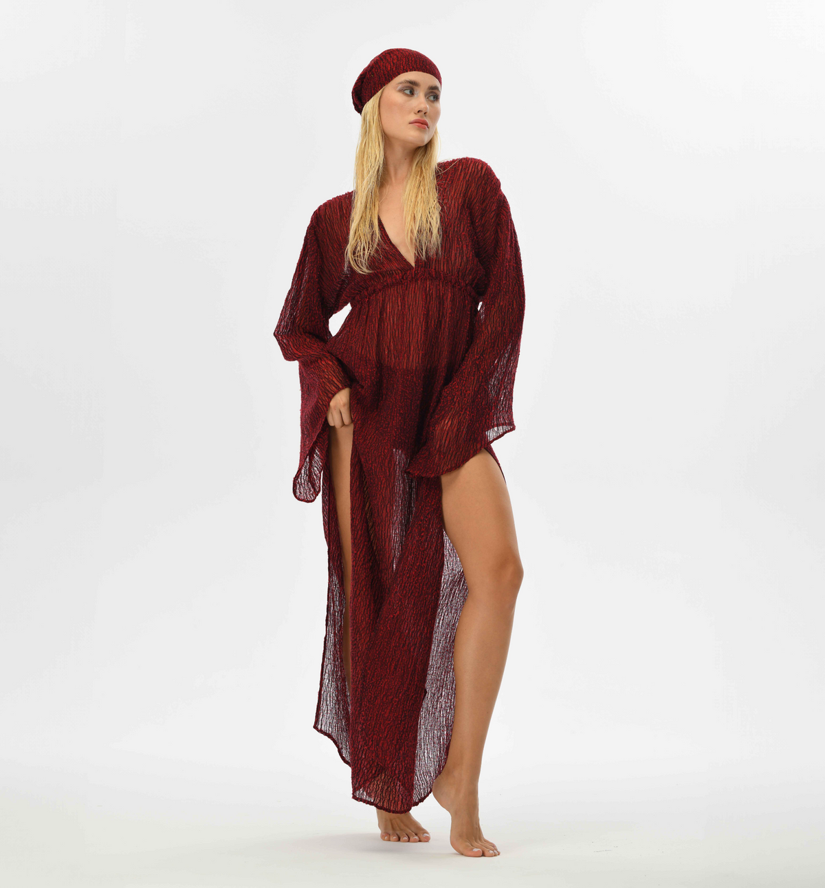 Red goddess kaftan dress with elastic waist, made from handwoven Turkish fabric. Features fairy sleeves and a see-through design, perfect for festivals, gatherings, and bohemian events.