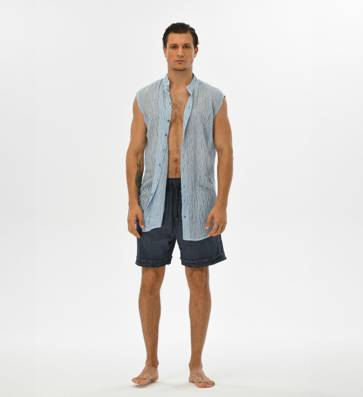 Bohemian unisex vest crafted from Turkish cotton in blue and white. This water-inspired design offers a relaxed fit, perfect for layering over casual outfits or festival looks. Lightweight and breathable, ideal for both men and women.