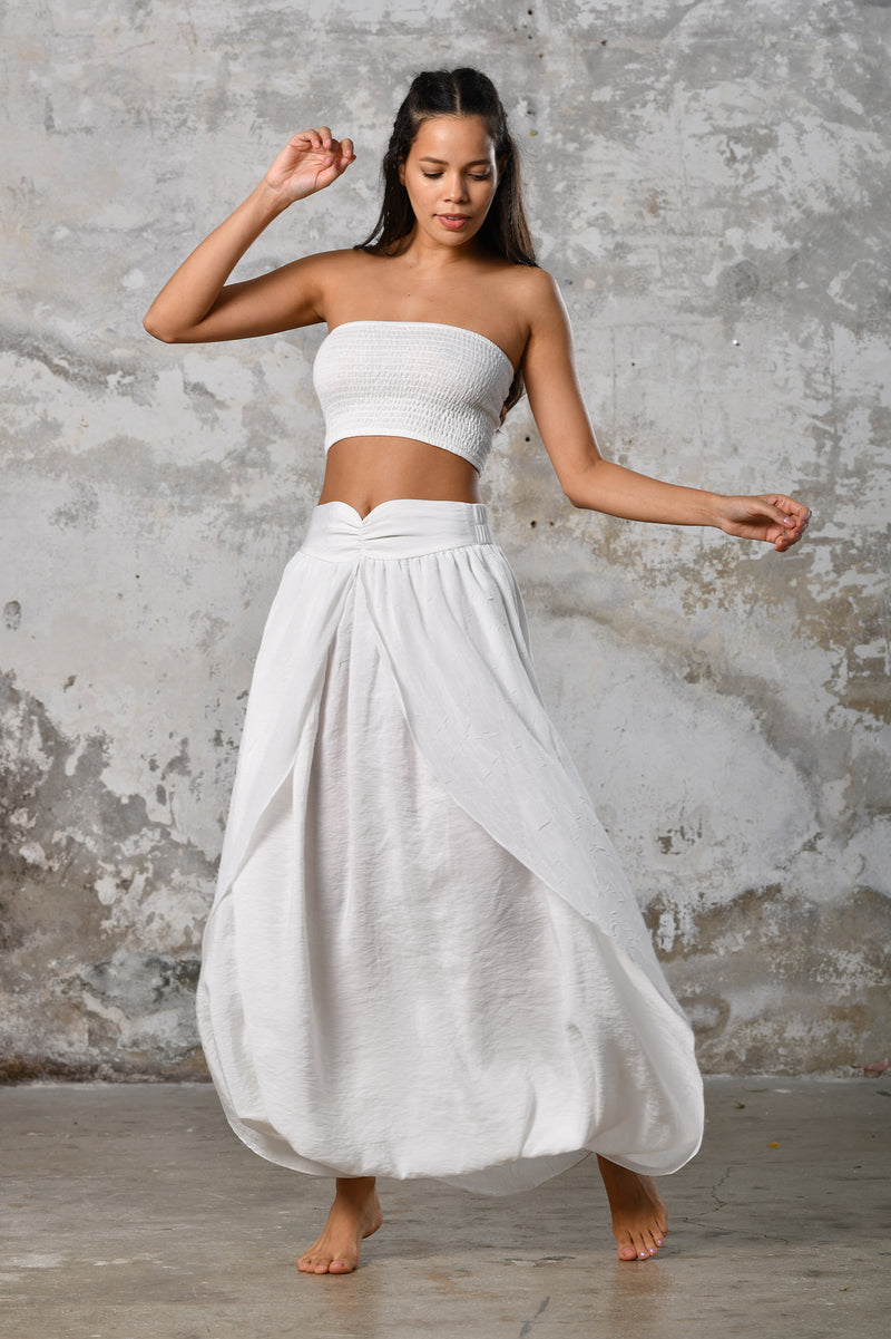 Step into timeless boho chic with our Boho high split skirt trousers. Crafted from organic materials, this sexy summer boho yoga pants , eco-conscious fashion for the modern goddess. Spiritual awakening boho ceremony clothing.