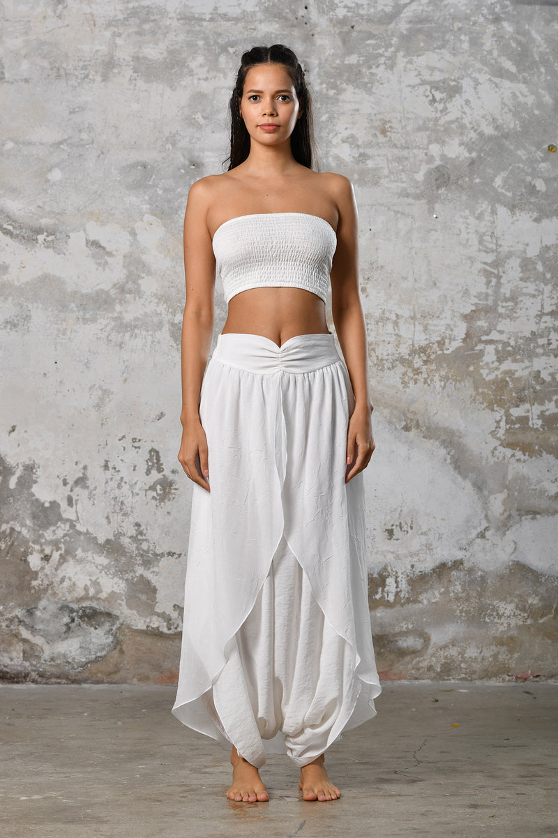 Step into timeless boho chic with our Boho high split skirt trousers. Crafted from organic materials, this sexy summer boho yoga pants , eco-conscious fashion for the modern goddess. Spiritual awakening boho ceremony clothing.