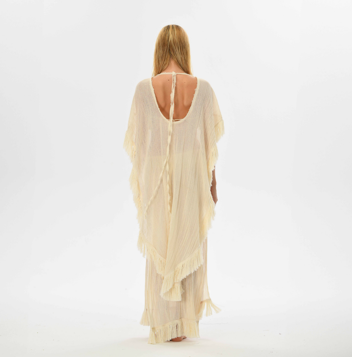 Giza Cape Kaftan in sheer cotton, designed with a flowy goddess cape and open back, ideal for boho beach style.