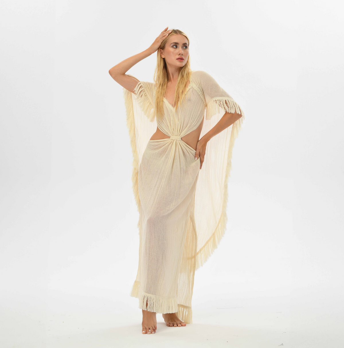 Boho cape kaftan made from sheer handwoven cotton, featuring a goddess cape and open back, perfect for beach or summer wear.