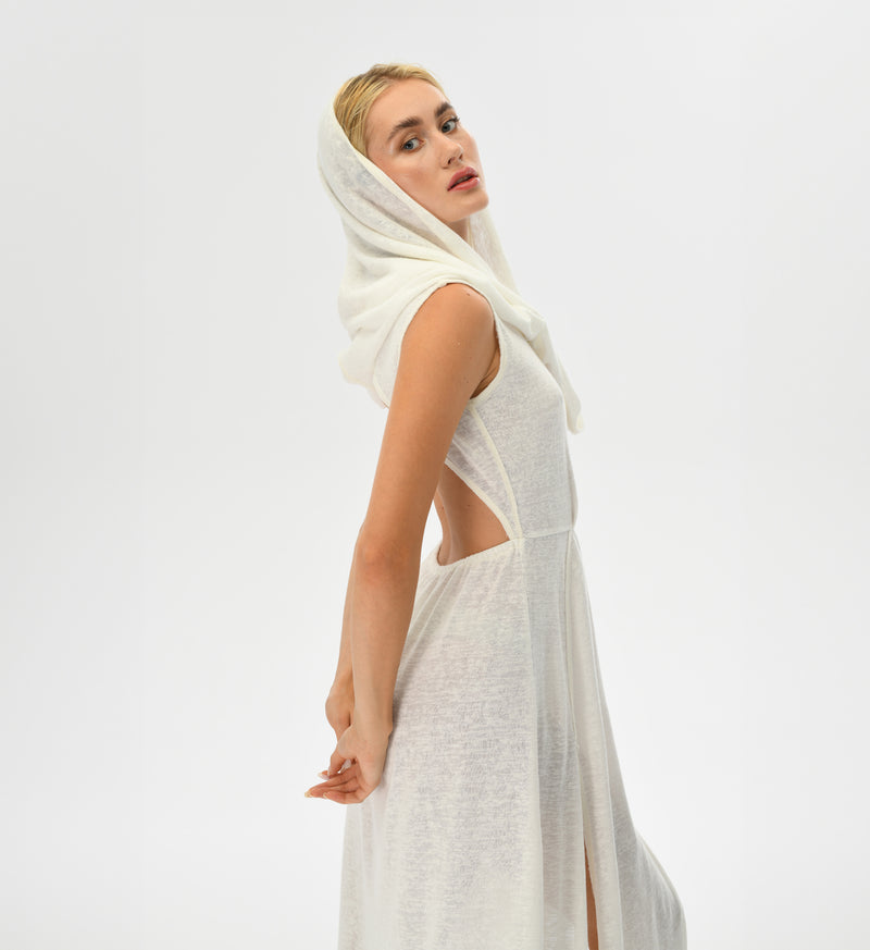 Bohemian goddess dress in white with a convertible hood-to-shawl, open back, and high side splits. Hand-dyed cotton and linen blend for unique boho chic style.