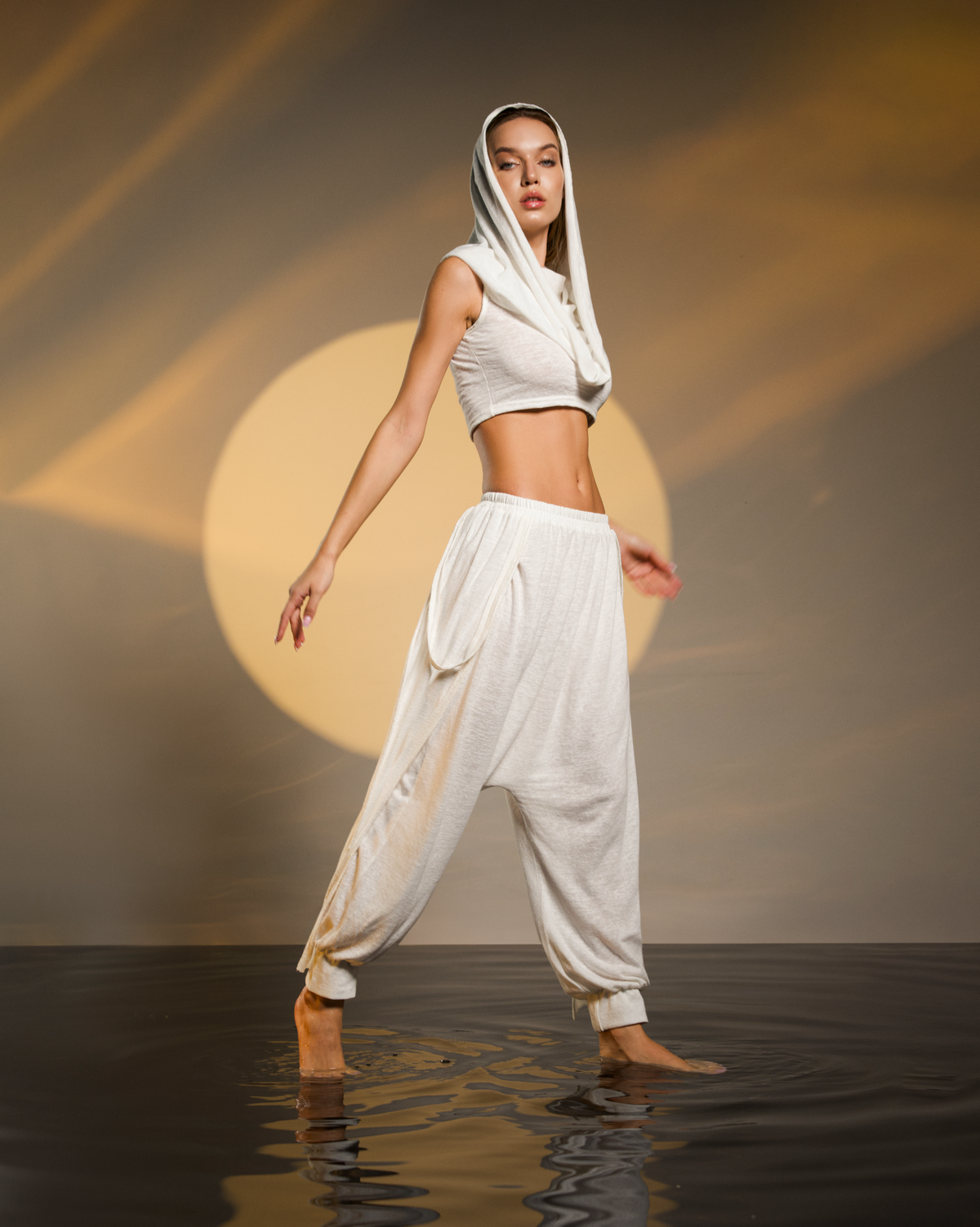 White linen and cotton hooded top with oversized warrior-style hood, perfect for boho chic outfits.