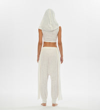 Mythical white hooded top with versatile oversized hood that can transform into a shawl, ideal for boho looks.