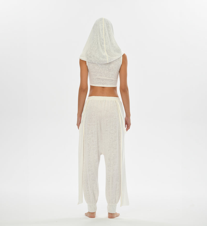 Mythical white hooded top with versatile oversized hood that can transform into a shawl, ideal for boho looks.