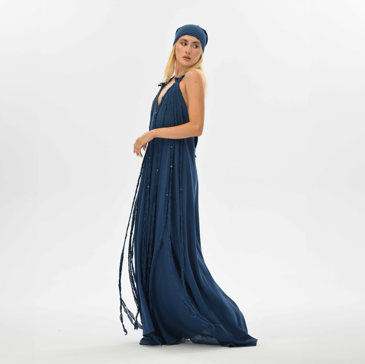 boho dress in navy blue with hand-braided details. Designed to fit all sizes, this luxurious bohemian dress is perfect for weddings, resorts, or festivals.