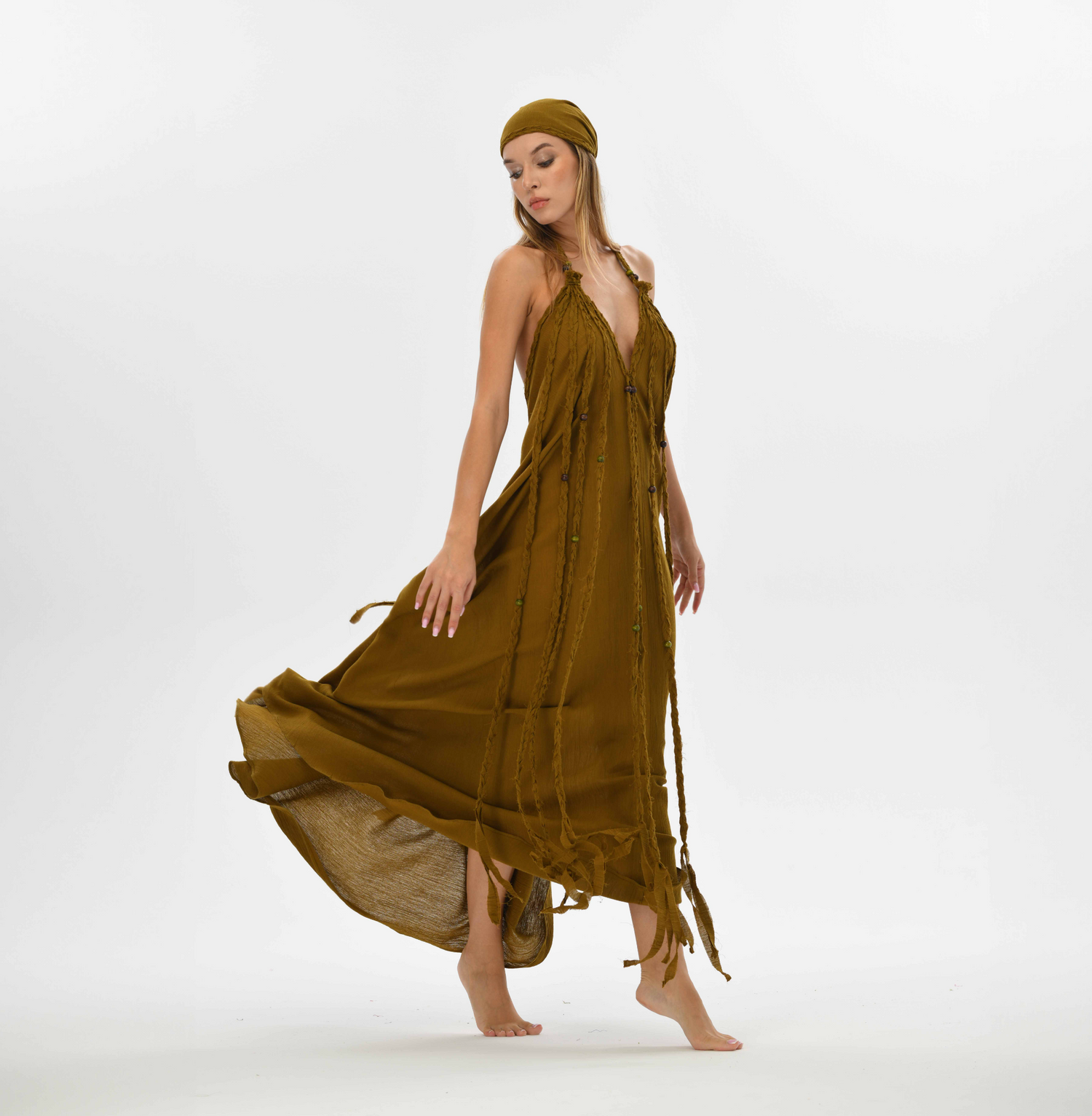 Hippie festival maxi dress in brown, featuring hand-braided embellishments and an open back. Perfect for beach weddings, summer events, or resort wear.