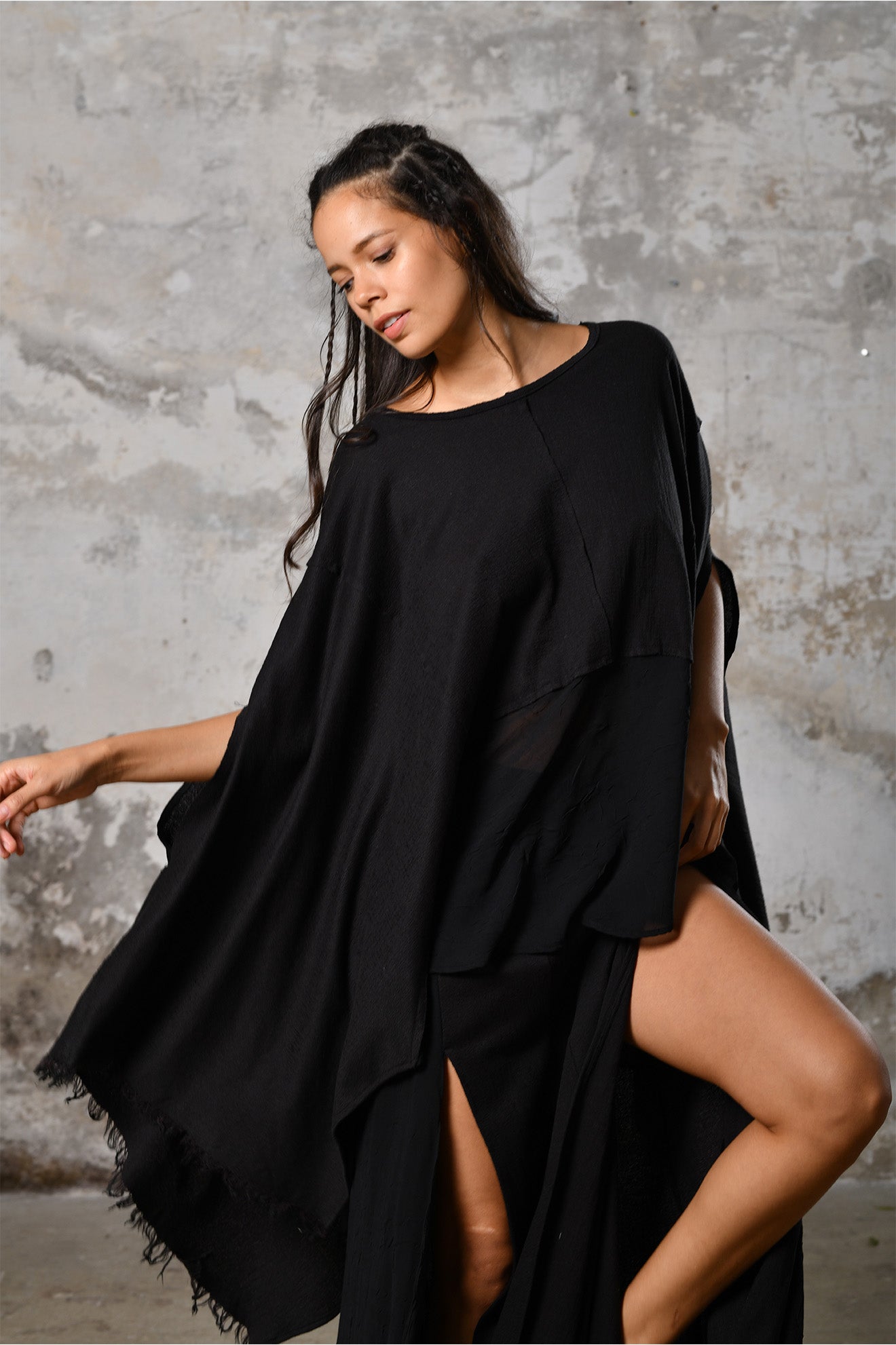 An enchanting Bohemian black poncho blouse unisex, perfect for boho and festival-inspired looks, exuding a goddess-like quality. black bohemian style perfect for Burning Man and other occasions. Menswear Boho Shirt. Boho sleeveless poncho unisex yogi