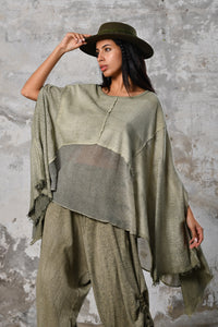 An enchanting Bohemian Leila, perfect for boho and festival-inspired looks, exuding a goddess-like quality. Green bohemian style perfect for Burning Man and other occasions. Menswear Boho Shirt. Boho sleeveless poncho unisex
