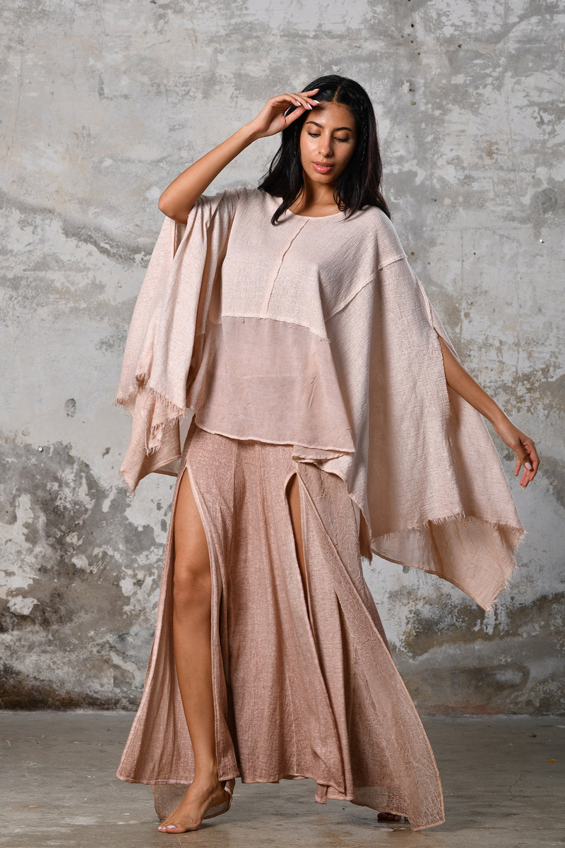 An enchanting Bohemian Leila, perfect for boho and festival-inspired looks, exuding a goddess-like quality. dusty pink bohemian style perfect for Burning Man and other occasions. Menswear Boho Shirt. Boho sleeveless poncho unisex