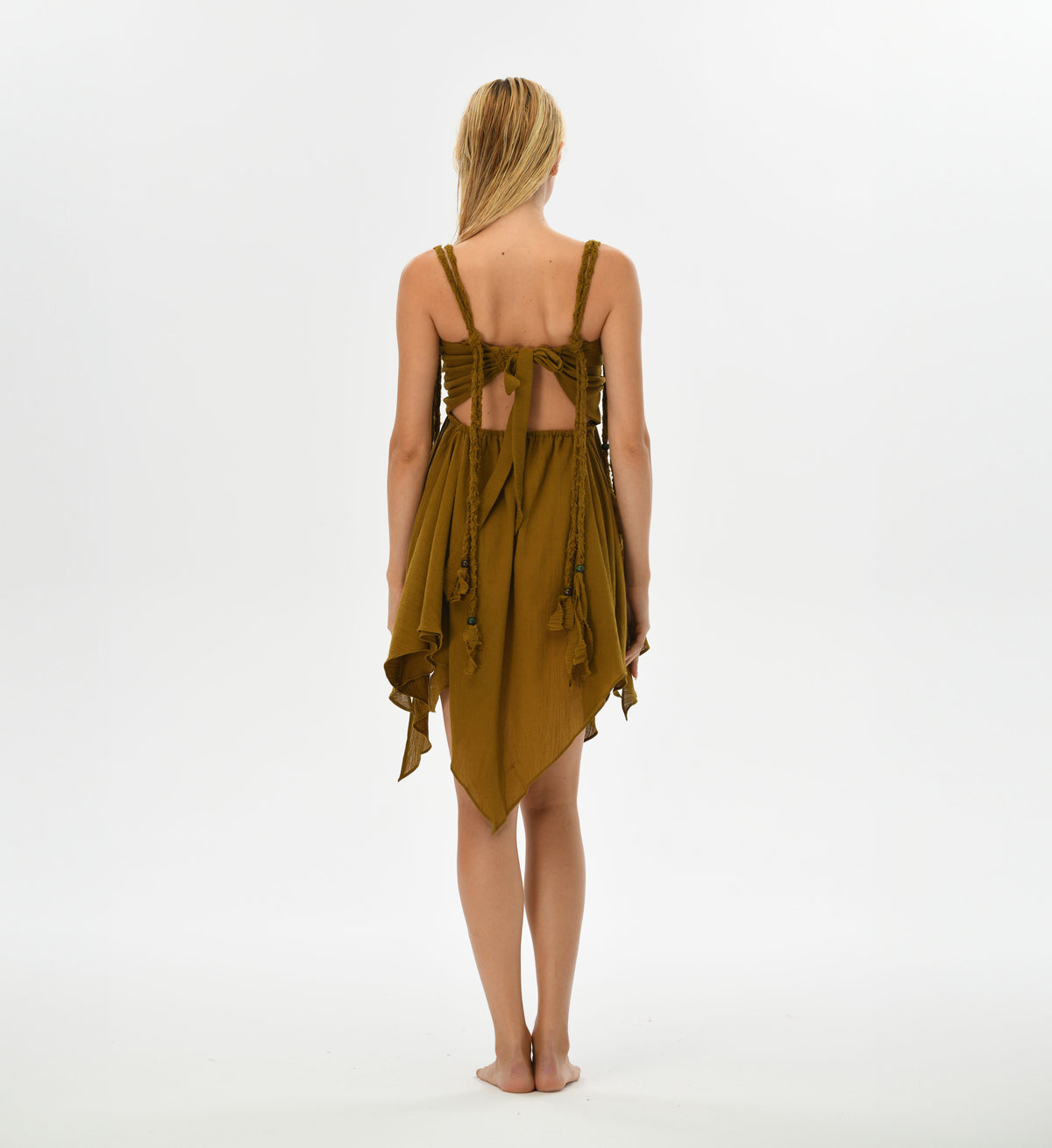 Whimsical brown fairy mini dress with adjustable back, hand-braided threads, and flowing skirt. This Turkish cotton dress embodies bohemian femininity and is perfect for festival fashion or resort wear