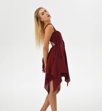 Luxurious Turkish cotton mini dress with hand-braided threads, adjustable back, and corset-like top. A flowy skirt adds a fairy-inspired, boho-chic touch, ideal for both casual wear and special occasions like festivals.