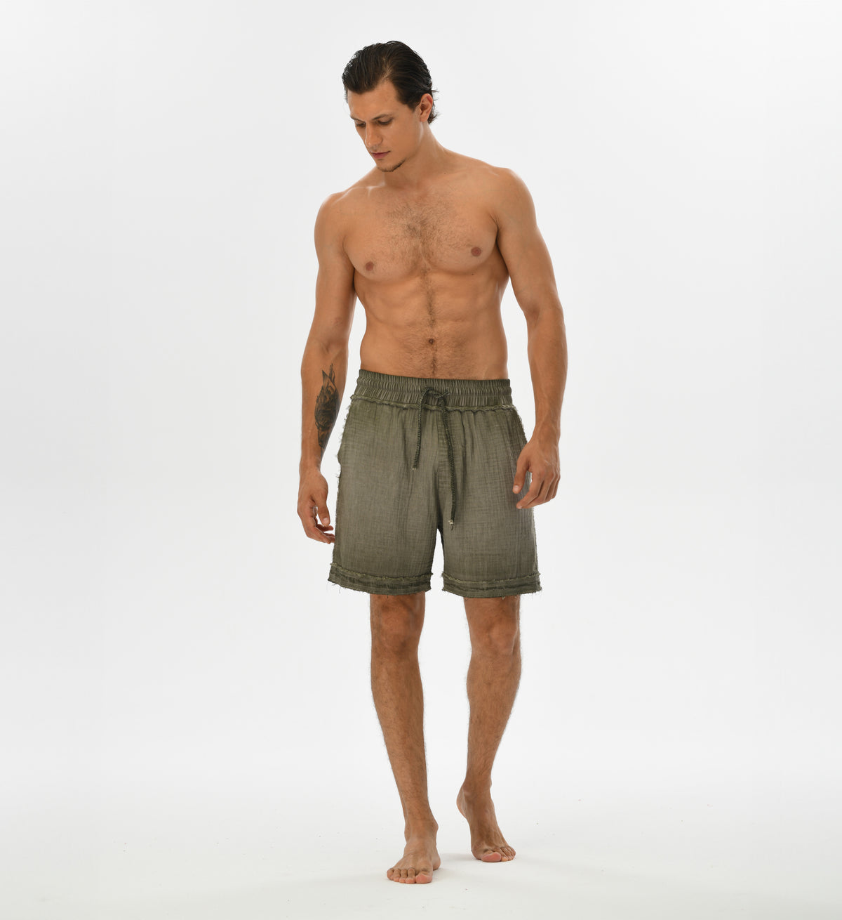 Men’s boho chic shorts in green, crafted from soft muslin Turkish cotton for summer comfort and style