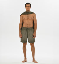 Green boho men’s shorts with breathable fabric, ideal for casual summer outings or bohemian-inspired looks.