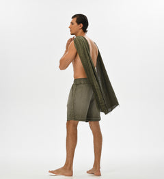 Comfy men’s green boho shorts, crafted from lightweight muslin cotton with a foldable hem for versatile summer looks.