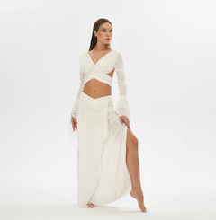 Bohemian white skirt with a unique goddess cut, featuring side splits for ease of movement. This belly dance and tribal fusion-inspired skirt fits sizes XS to L with an elastic waistband.