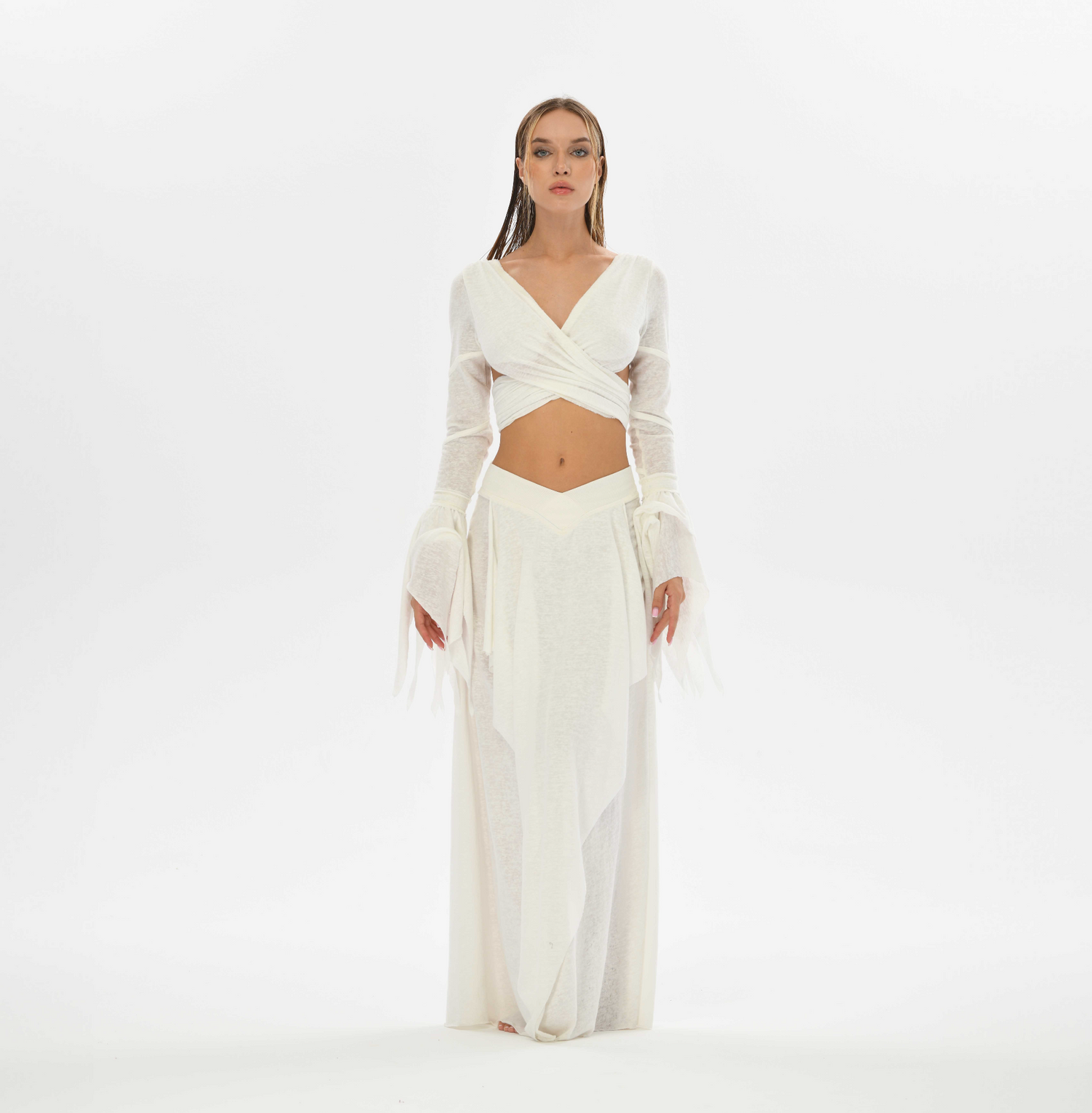 Belly dance-inspired skirt in white with a high or low waist option, crafted from cotton and linen. Features side splits and an elastic waistband, perfect for gypsy and boho fashio