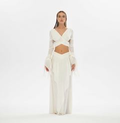 Belly dance-inspired skirt in white with a high or low waist option, crafted from cotton and linen. Features side splits and an elastic waistband, perfect for gypsy and boho fashio