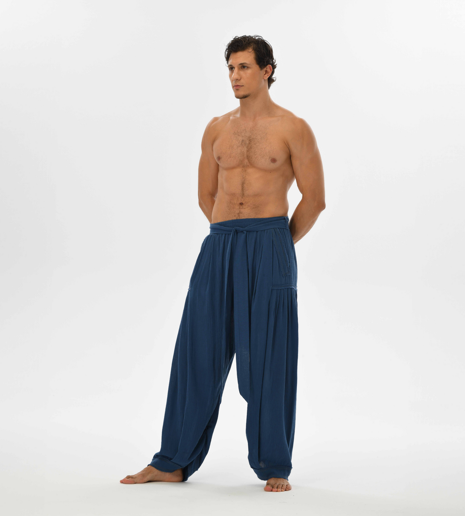 Loose blue yoga pants for men, made from cotton, perfect for casual wear, bohemian styling, or lounging at home.