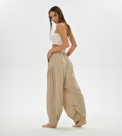 Women’s beige boho pants, featuring a relaxed harem cut, perfect for everyday comfort, lounging, or yoga sessions.