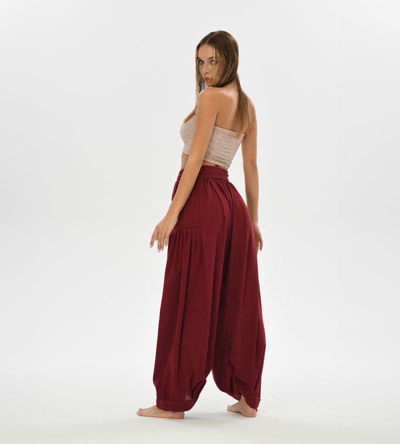 Loose harem pants in red, made from breathable cotton, perfect for women’s daily comfort, yoga sessions, or bohemian style outfits.