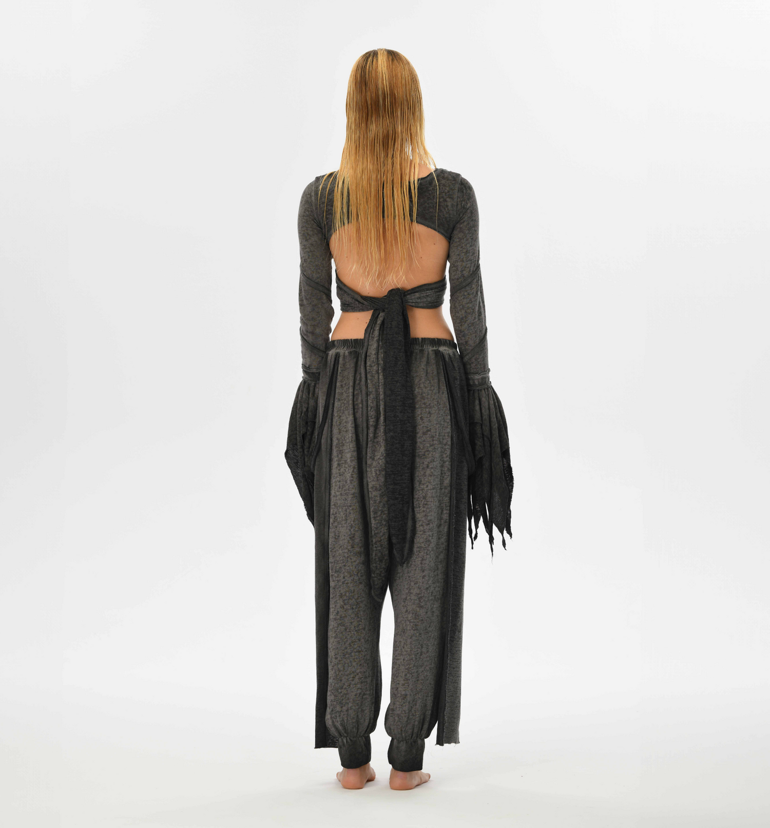 Gray boho bolero top with an open back, tie-front design, and flowy fairy sleeves, perfect for casual or festival wear.