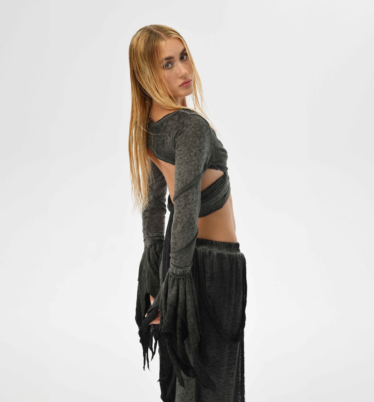 Fairy-inspired boho top in charcoal gray, featuring flowy sleeves and open back for a sexy and mystical look, perfect for festivals.