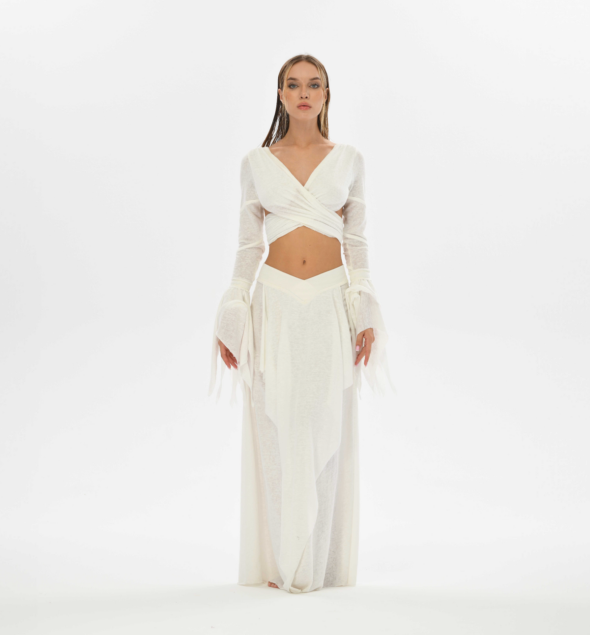 Boho bolero top in white, featuring an open back and fairy-inspired sleeves, ideal for bohemian and fairy-style outfits.