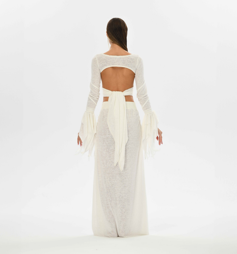 Fairy-inspired boho top in white, featuring flowy sleeves and open back for a sexy and mystical look, perfect for festivals.