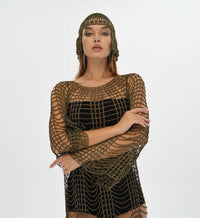 Golden crochet dress with matching headpiece, featuring a flowy, see-through design for a sexy yet elegant boho style.