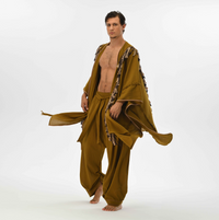 Organic shamanic cloak for men in brown, featuring fringe and handmade tassels, perfect for winter wraps or summer festival wear.