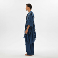 Bohemian kimono poncho in navy blue, featuring fringe and braids, made from organic cotton, ideal for men’s boho chic and shamanic style outfits.