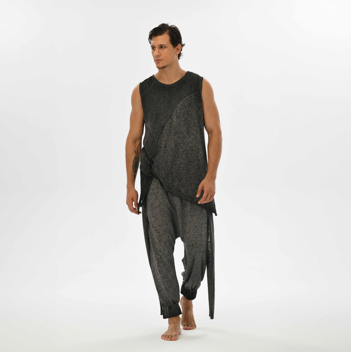 Gray harem pants for men, crafted from breathable linen and cotton, offering a flowy fit for casual or festival wear.