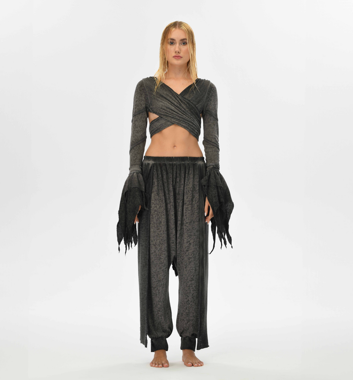 Loose-fitting gray harem pants with alchemist and gypsy vibes, made from a linen-cotton blend. Ideal for festivals, casual outings, and boho style. Available in two sizes for a flexible fit.