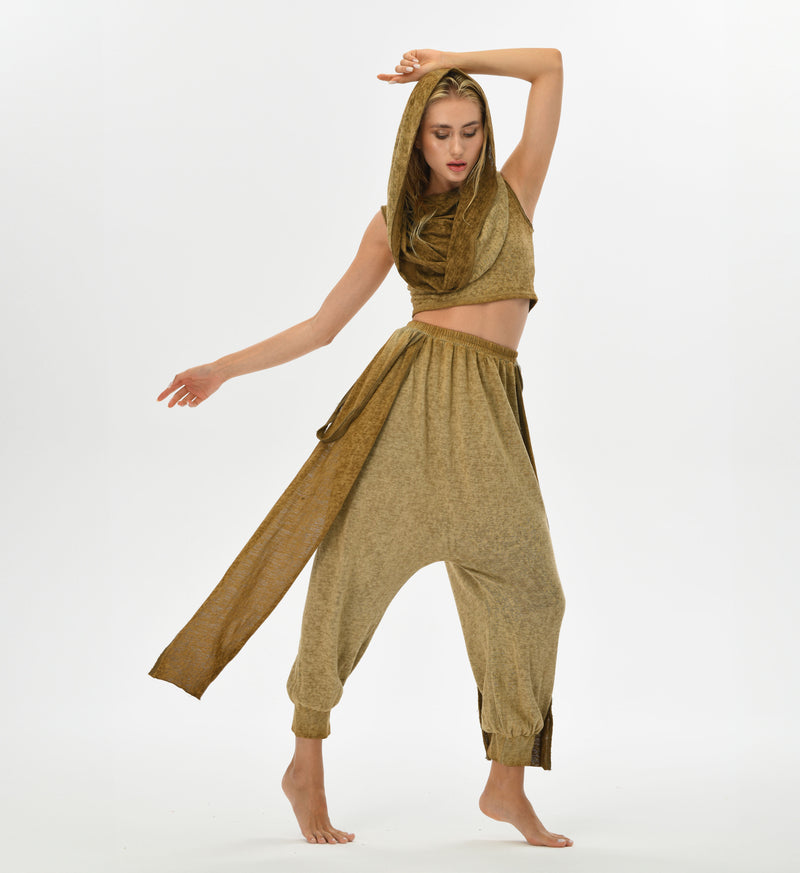 Gypsy style harem pants in a loose, comfortable fit. Crafted from linen-cotton blend with an elastic waistband, these pants are perfect for festivals, casual boho outfits, or lounging at home.