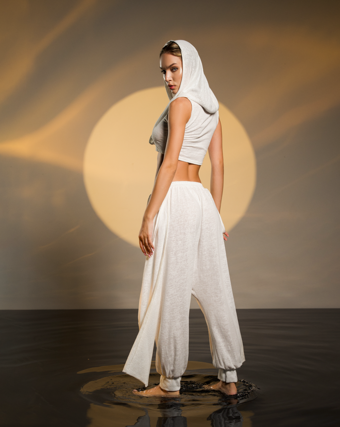 White harem pants with alchemist and gypsy vibes, crafted from linen and cotton blend for daily comfort. Perfect for festivals, casual outings, or lounging. Available in two sizes XS-S-M and L-XL.