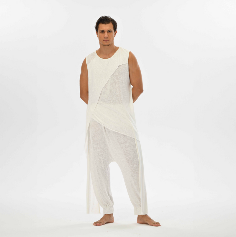 Comfy white men’s harem pants with elastic waistband, ideal for burning man festivals or casual boho chic fashion.