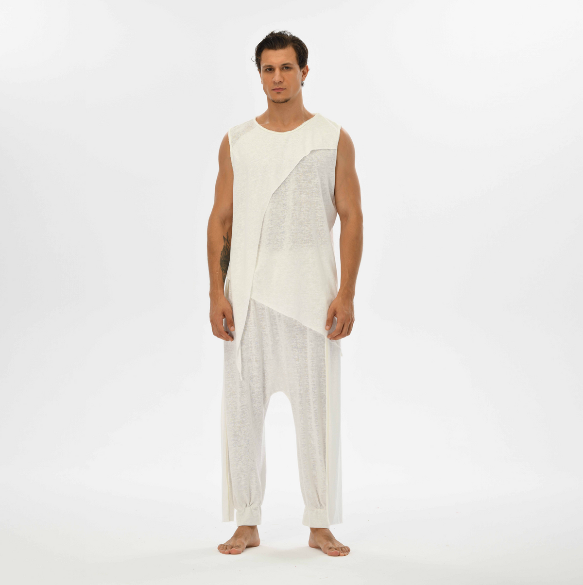 White harem pants for men, featuring a loose fit and gypsy-inspired style, perfect for casual or boho festival fashion.