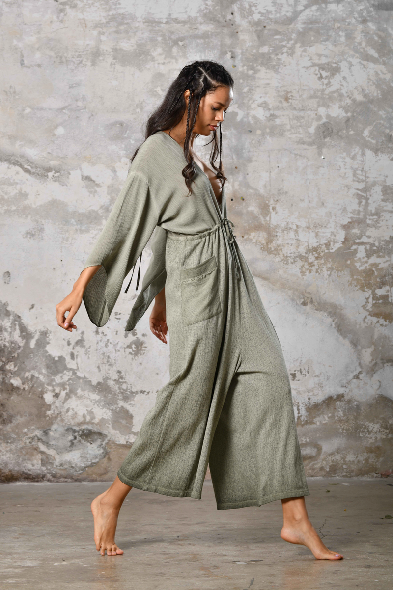 Elevate your style with our Greek Goddess Asymmetrical Jumpsuit. This unique boho chic jumpsuit with an asymmetrical design is perfect for beach weddings and festivals. Handmade for comfort, it's a great choice for those seeking elegant, goddess-inspired fashion.