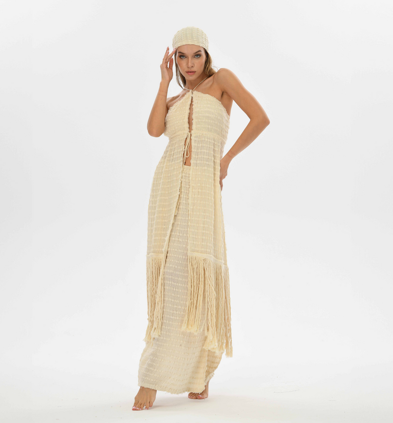 Zaria Fringe Top in handwoven cotton with an open back and tie front, featuring long fringes perfect for boho chic style.