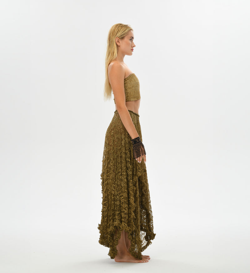 Gypsy-inspired lace skirt in desert sand, featuring a flowy big cut and elastic waistband, perfect for layering over bikinis or leggings.